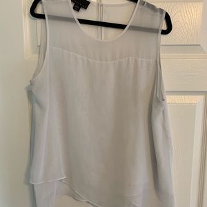 White sleeveless blouse